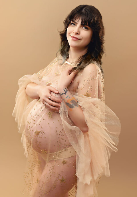 maternity photographer near Atlanta, studio portrait in sheer dress with ruffles
