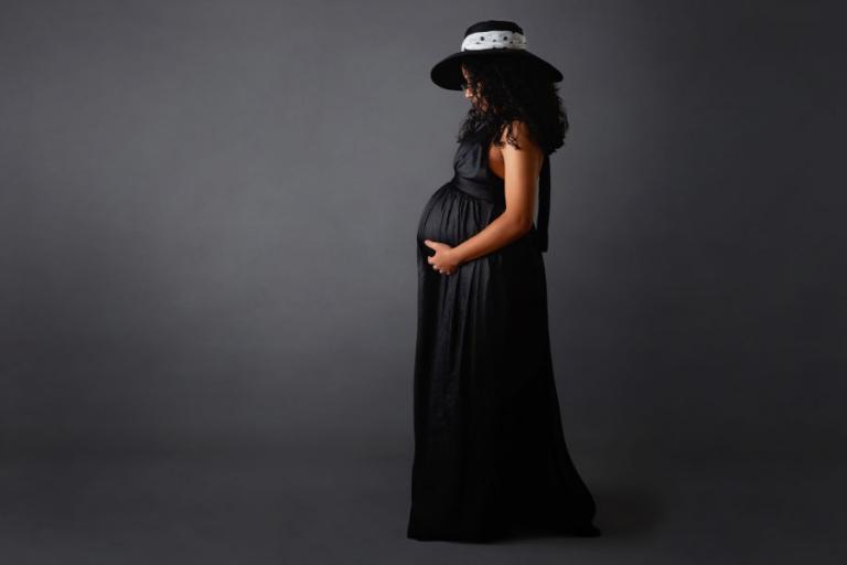 Douglasville maternity photographer, black dress on gray studio backdrop