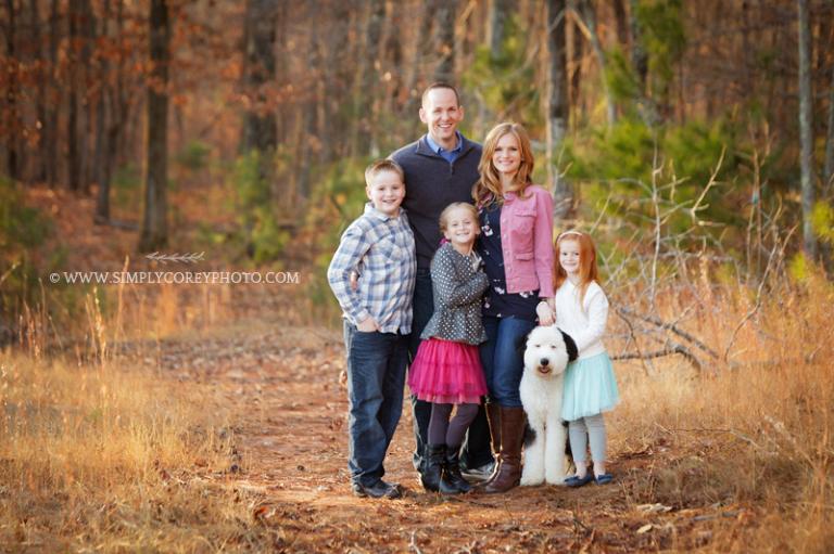 family of 5 with their dog by Atlanta family photographer