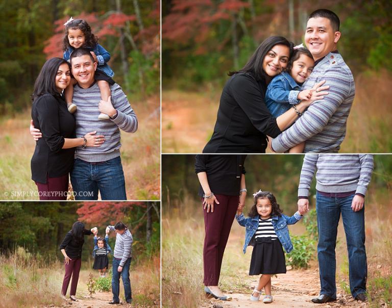 mom and dad with a toddler during an outdoor photography session by Atlanta family photographer