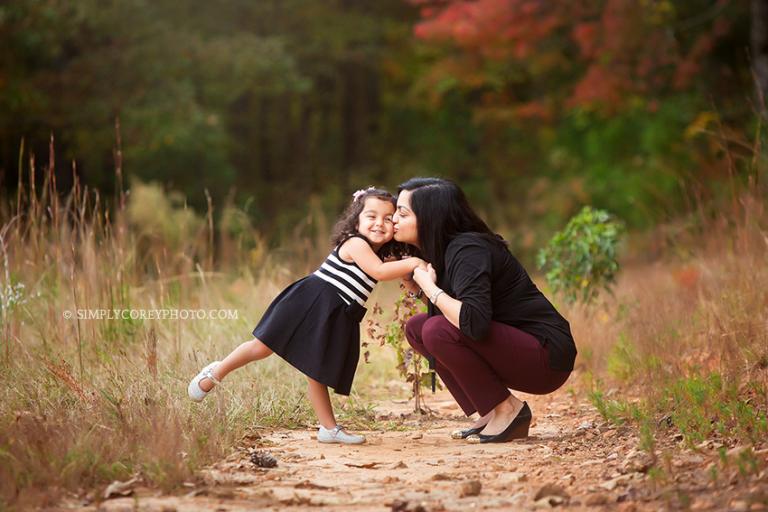 mommy and toddler during an outdoor photography session by Atlanta family photographer