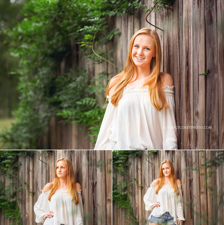 teen girl near a fence by Atlanta senior portrait photographer