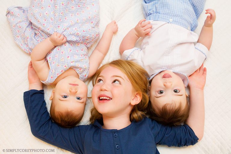 big sister with baby twin siblings by Atlanta children's photographer