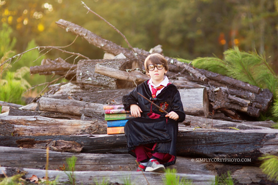 magical Harry Potter themed portraits with books by Atlanta child photographer