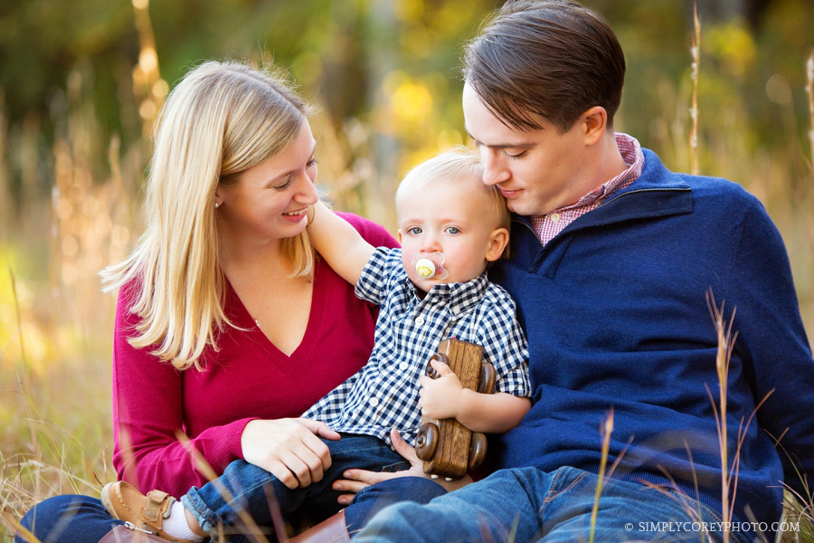 family in a field by Atlanta baby photographer