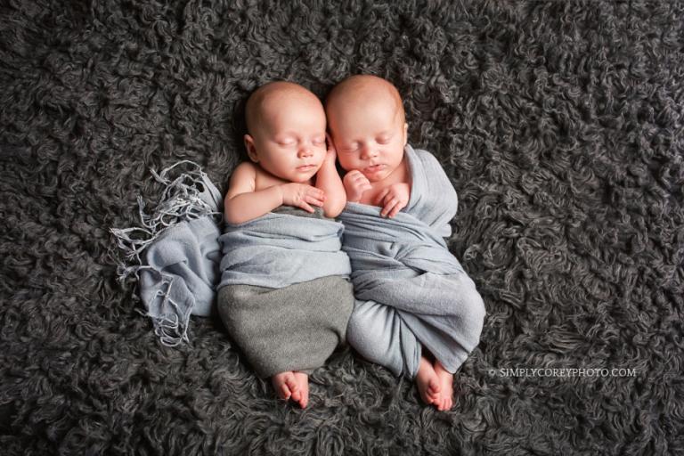 twin baby boys in grey wraps by Atlanta newborn photographer