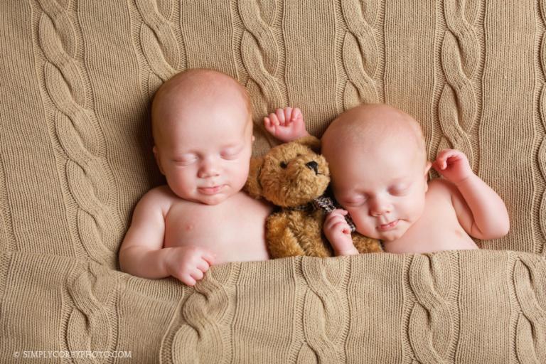 twin baby boys with a teddy bear by Villa Rica newborn photographer
