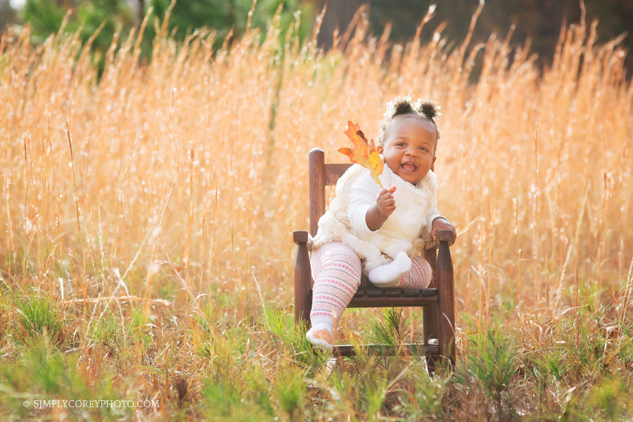 fall portrait of a toddler in a rocking chair by Douglasville baby photographer