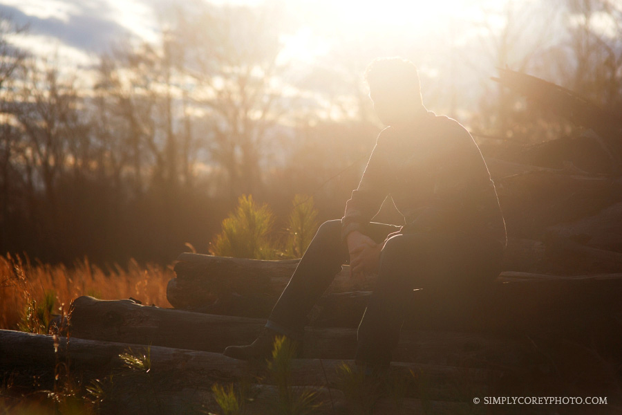 creative Carrollton senior portraits of a teen boy outside