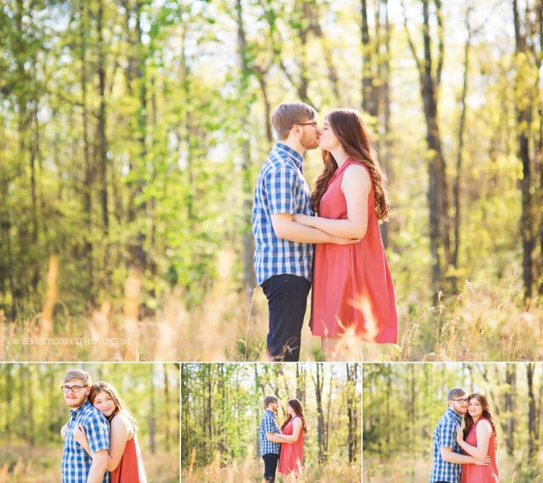 engaged couple in tall grass by Carrollton engagement photographer