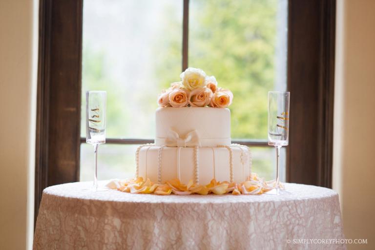 Intimate Eats wedding cake with fresh flowers by Marlipaige Florals, Atlanta wedding photographer