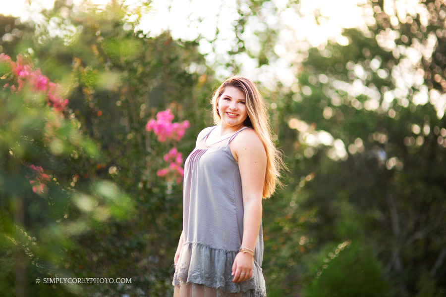 Atlanta senior portrait photography of a teen girl with flowers