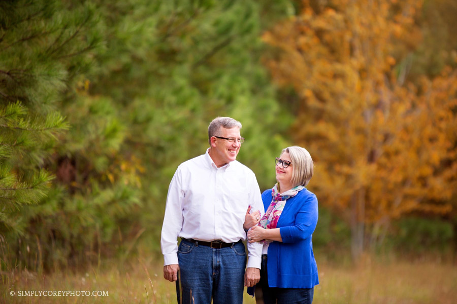 Atlanta anniversary photography of a couple outside by fall trees