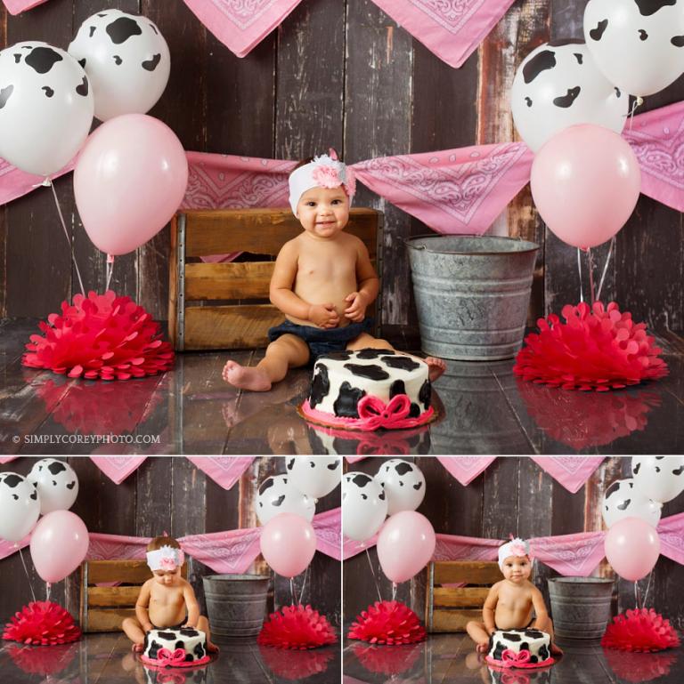 baby girl with paisley and cow decorations by Douglasville cake smash photographer