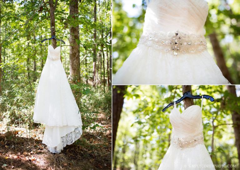 David's Bridal lace wedding dress hanging in trees by Atlanta elopement photographer