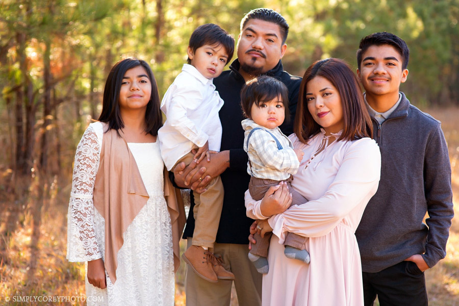 parents with four kids by Carrollton family photographer
