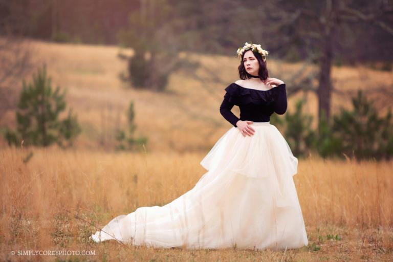 senior portrait photographer Atlanta, girl in a golden field with a tulle skirt