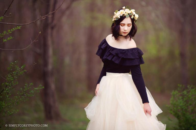 senior portrait photographer, Douglasville, teen with a flower crown outside