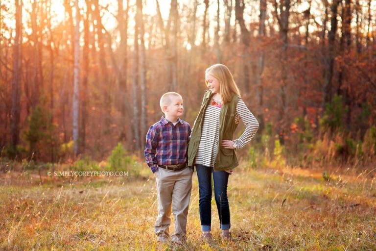 Douglasville children's photographer, fall portrait of siblings in a field