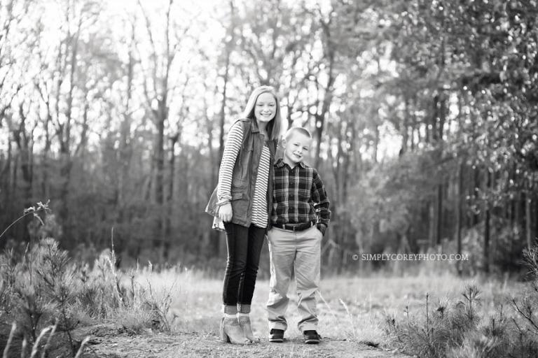 Newnan children's photographer, fall portraits of siblings outside