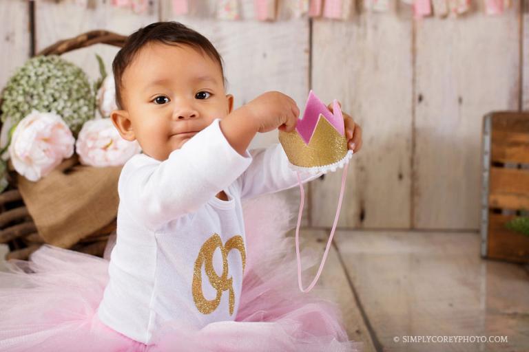 one year photography session with a gold crown and pink tutu by Atlanta baby photographer