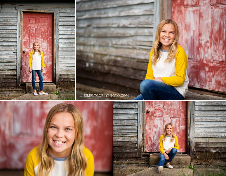 Villa Rica child photographer, tween girl in front of a red barn door