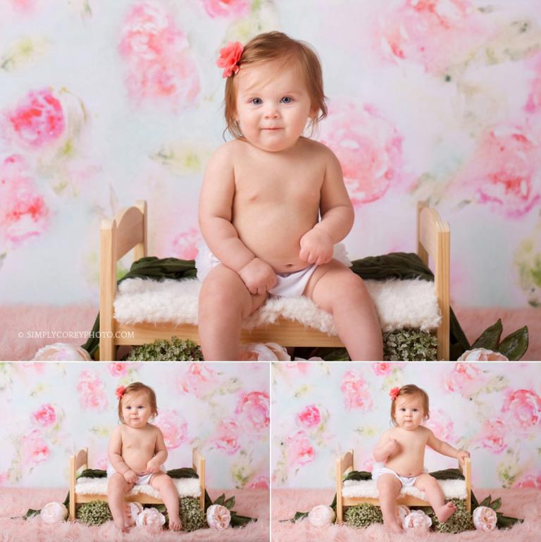 Douglasville baby photographer, baby girl on a little bed with pink flowers