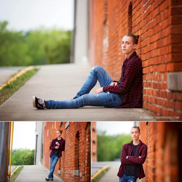 Carrollton, Georgia senior portraits of a teen boy downtown by a brick wall