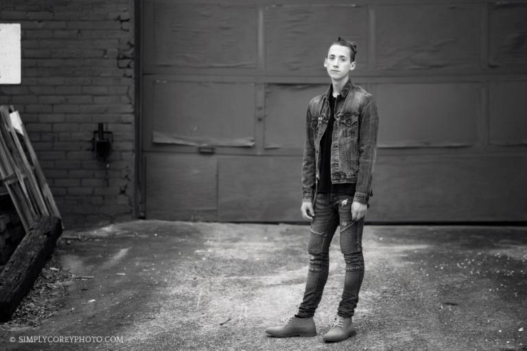 senior portrait photographer Newnan, teen boy downtown in black and white