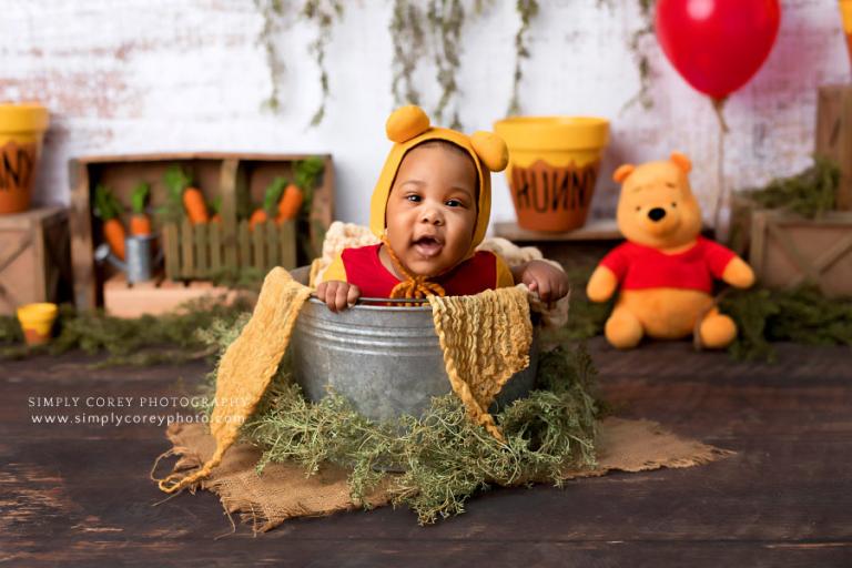 baby photographer near Douglasville, Pooh milestone session with hunny pots