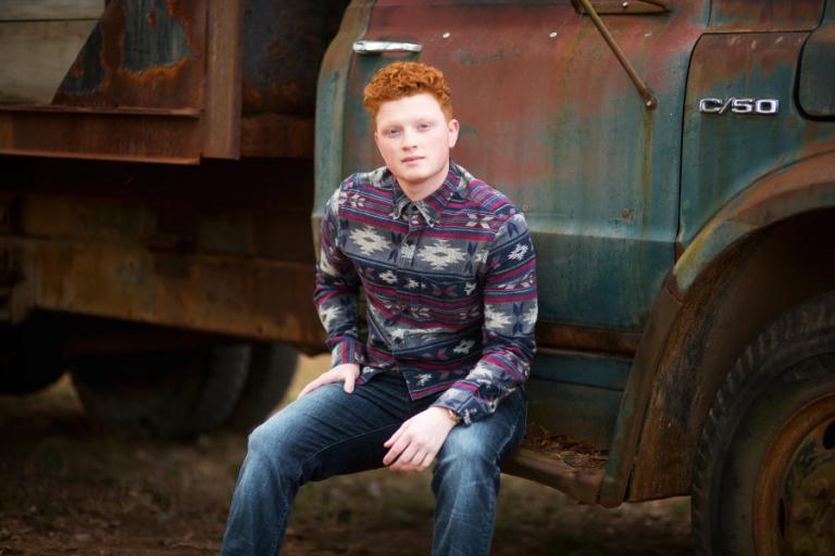 senior portraits Atlanta; redhead boy with a vintage truck
