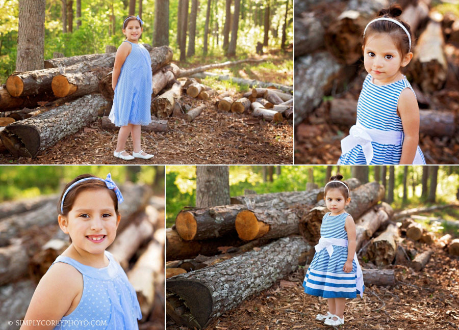 Villa Rica children's photographer, sisters outside in blue dresses