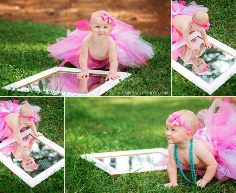 Bremen baby photographer, girl in tutu with a mirror outside