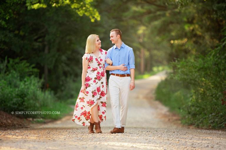 Carrollton anniversary photographer, couple walking down country road
