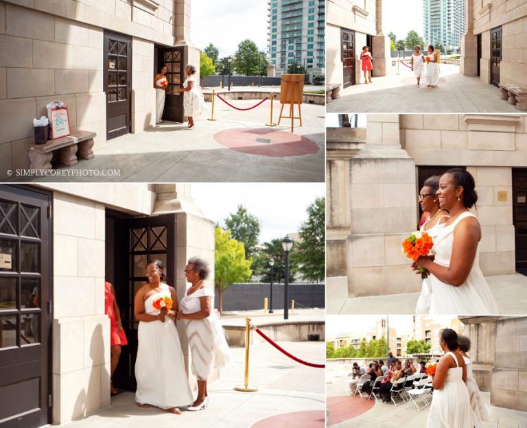 bride and mother walking down aisle at Millennium Gate by West Georgia wedding photographer
