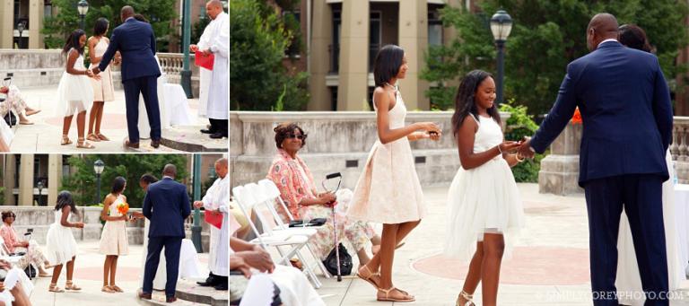 daughters giving bride and groom rings by Douglasville wedding photographer