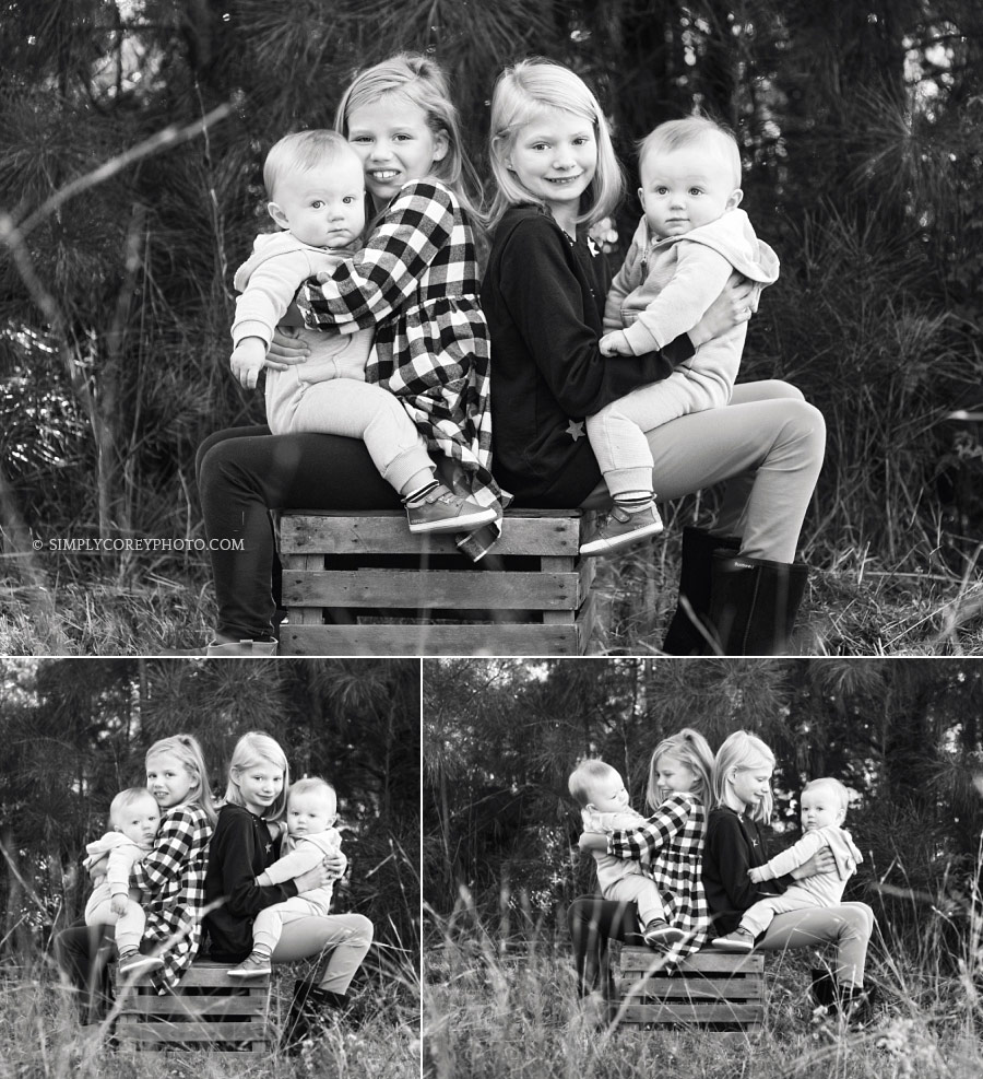 Douglasville family photographer, sisters holding twin baby boys
