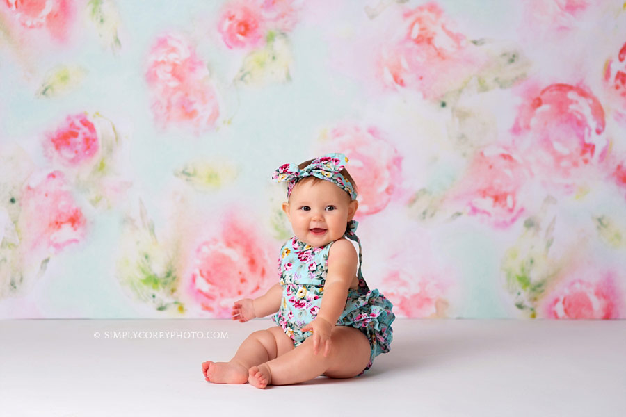 baby photographer Douglasville, girl in blue with pink flowers