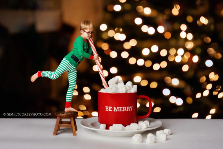 Atlanta photographer, creative holiday photography of a boy as an elf with a cocoa mug