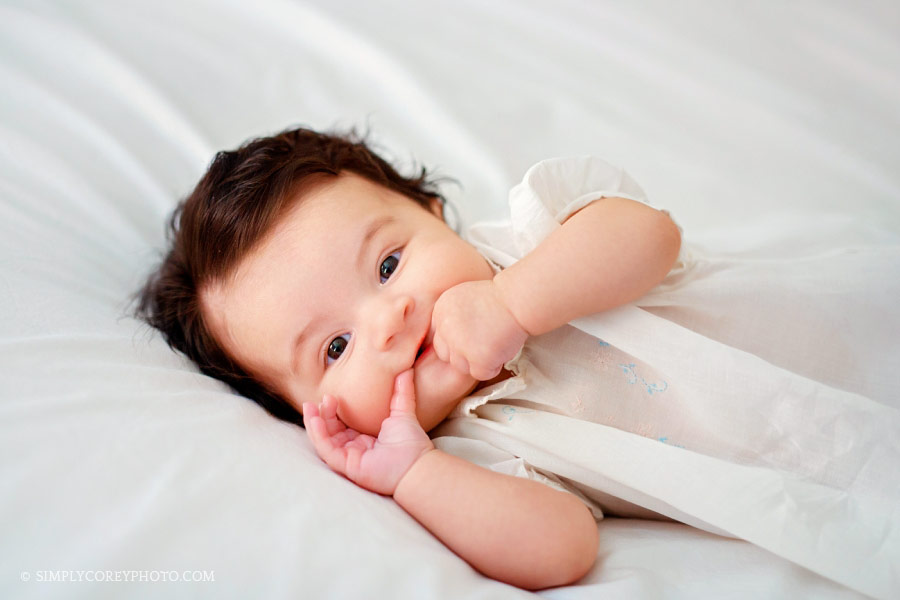 Villa Rica baby photographer, girl with a head full of hair in a vintage dress