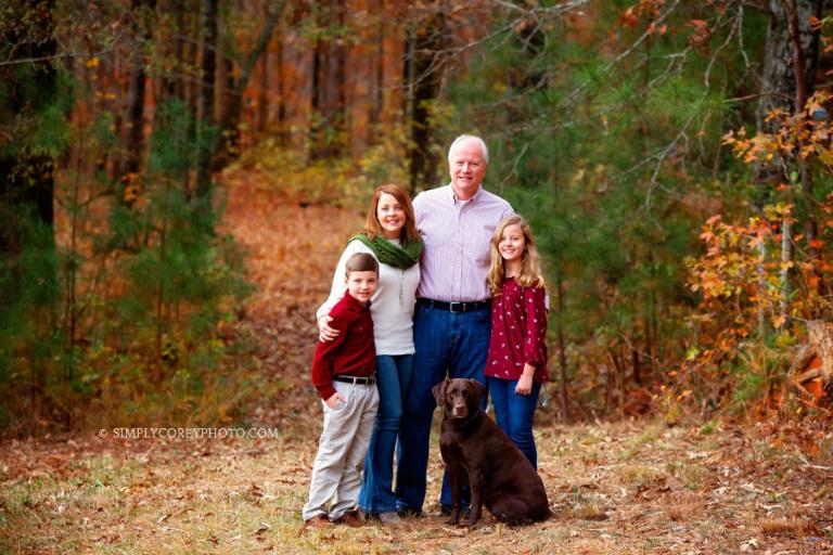 Carrollton family photographer, fall portrait outside with a dog