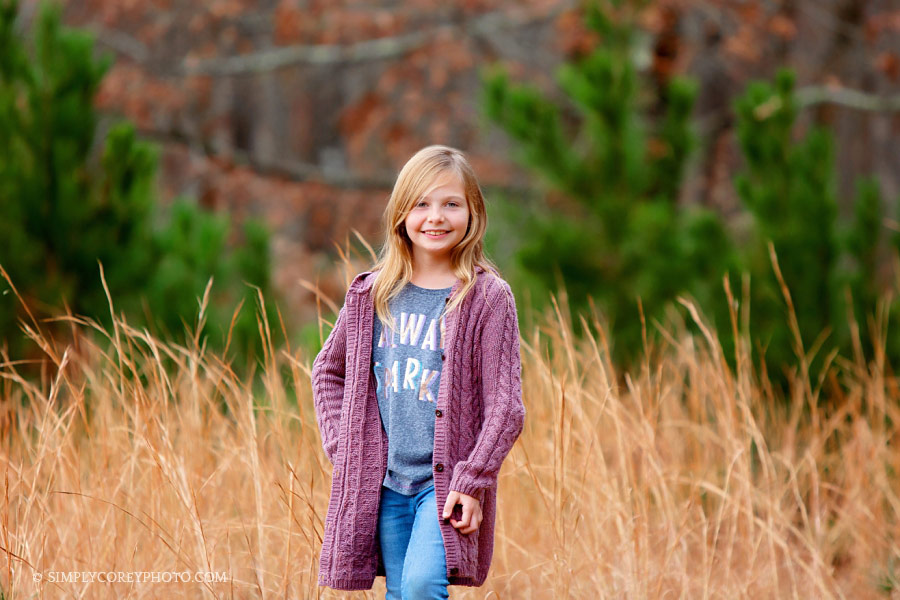 Douglasville children's photographer, girl outside in a golden field