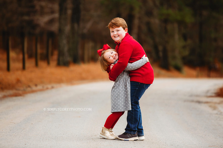 family photographer near Carrollton, GA; kids outside in winter