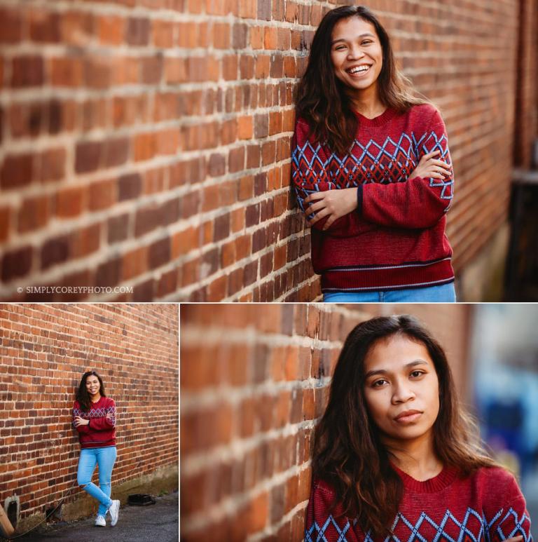 Villa Rica senior portrait photographer, teen girl by a brick wall