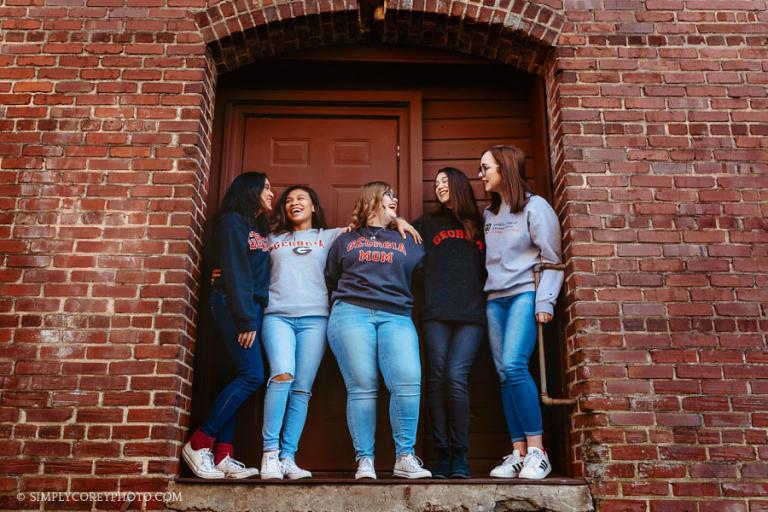 Villa Rica senior photographer, college friends in UGA sweatshirts