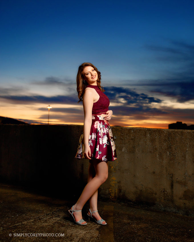senior portrait photographer near Villa Rica, teen outside at sunset