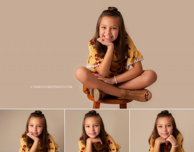 Newnan children's photographer, studio portraits of a girl with a top knot