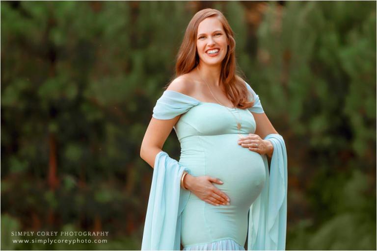 Atlanta maternity photographer, outside pregnancy session in green dress