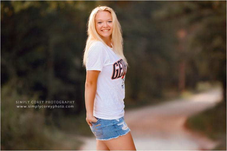 Douglasville senior portrait photographer, teen girl in UGA shirt