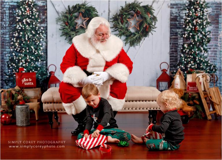 Carrollton Santa Claus mini session photographer, kids opening presents